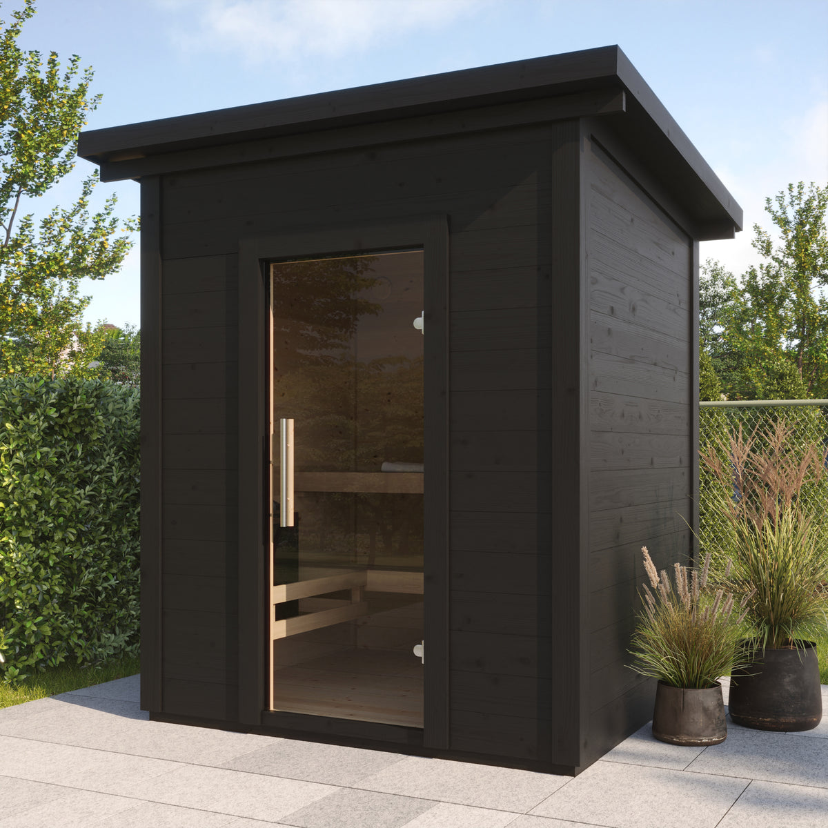 SaunaLife Model G2B black outdoor sauna on a patio