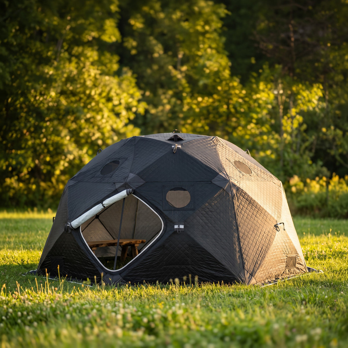 SaunaTrekker XL sauna tent set up on a lawn