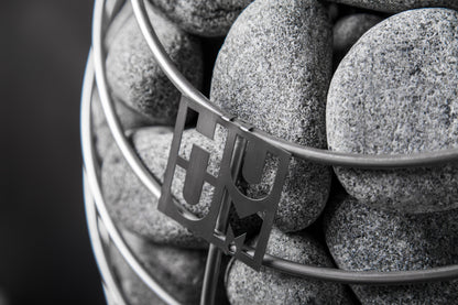 HUUM DROP sauna heater - steel frame and stones close-up