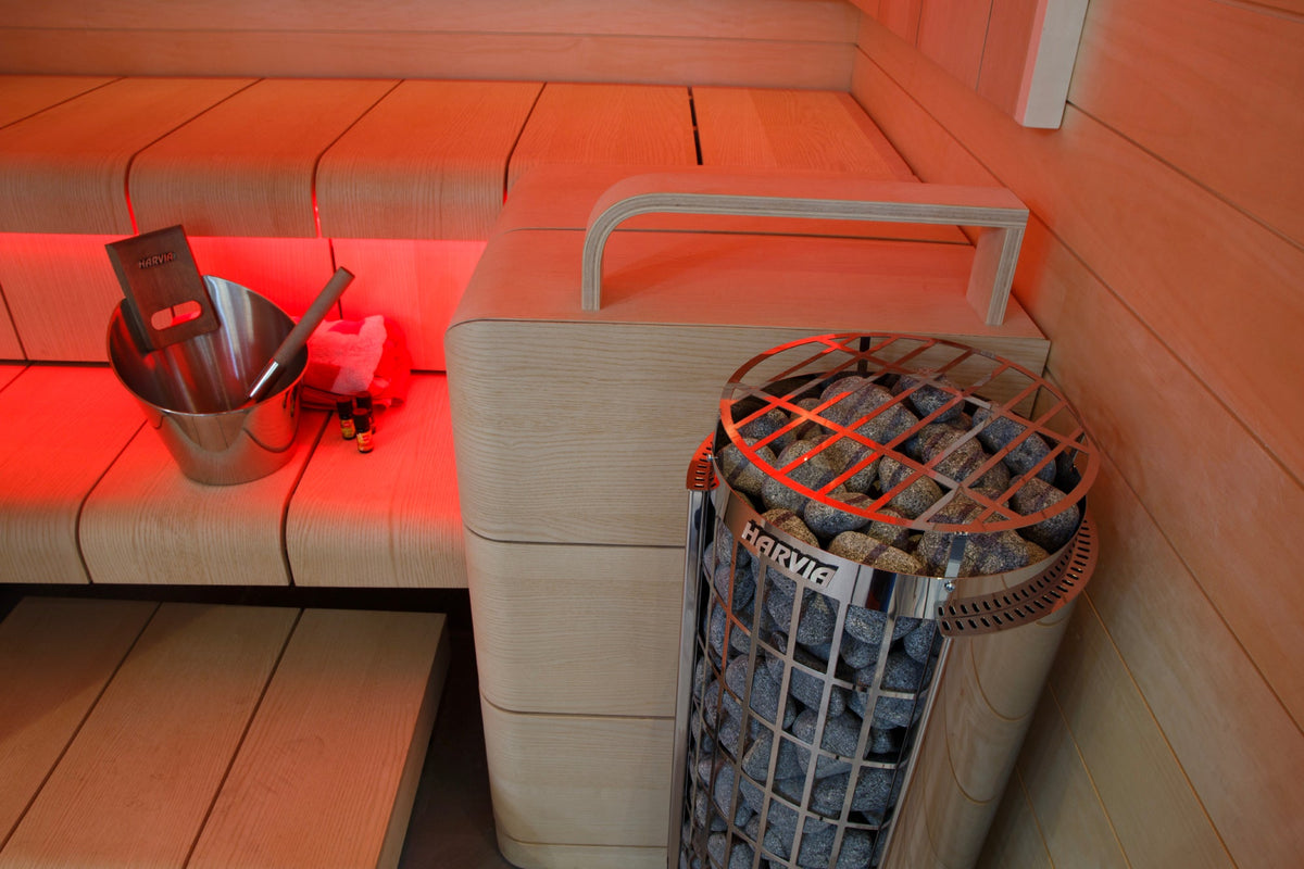 Harvia Cilindro Half PC80 - installed in sauna with red mood lighting