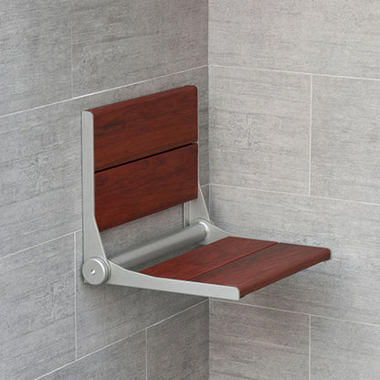 ThermaSol bamboo shower seat folded against the wall