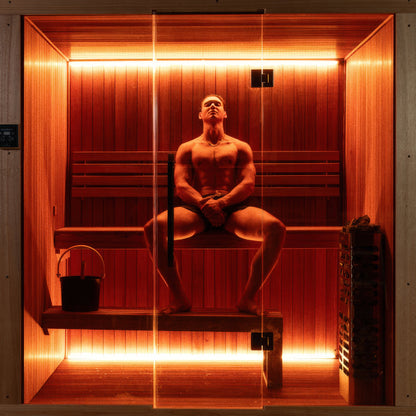 Canadian Timber Element Studio Indoor Sauna — two people on the bench under the LED backlight