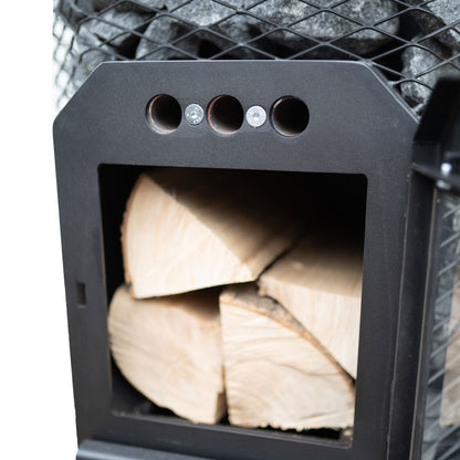 Cozy Heat O 18kW wood-burning sauna stove loaded with stones