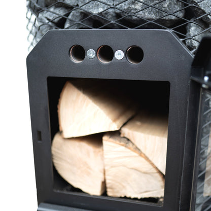 Cozy Heat 18kW through-wall wood-burning sauna stove loaded with stones